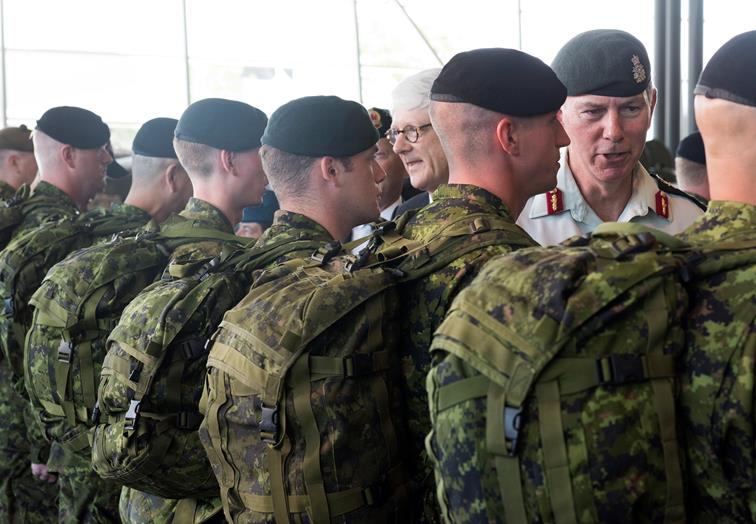 The ambassador for the Kingdom of the Netherlands, Mr. Cees Kole, and the Reviewing Officer for the Task Force Nijmegen 2016 Departure Parade, the Vice Chief of the Defence Staff Lieutenant-General Guy Thibault, inspect the Canadian marching contingent, made up of teams from the National Capital Region, the Royal Canadian Dragoons, the Cameron Highlanders of Ottawa, and the Canadian Grenadier Guards, at the Canadian War Museum on July 12, 2016. Photo by MCpl Melissa Spence, 4th Canadian Division – Canadian Army Public Affairs