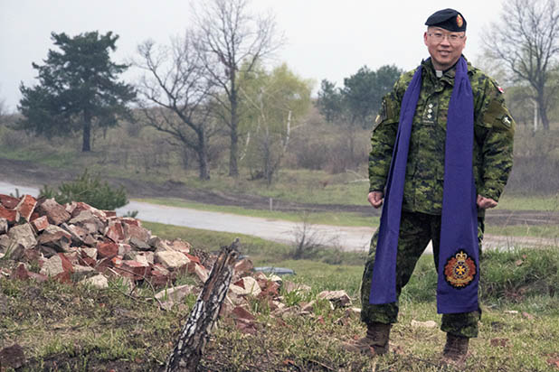 Canadian Armed Forces Chaplain, Captain Min Kim, prepares to lead Easter morning services at the International Peacekeeping and Security Centre in Starychi, Ukraine. Padre Kim is currently serving on Operation UNIFIER.
